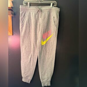 Women’s Nike Gray Joggers with Pink Logo and Yellow Swoosh